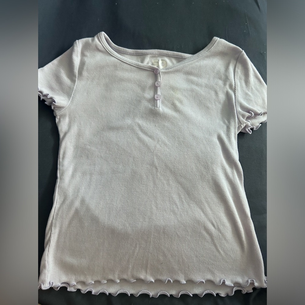 Shirt with designed buttons. Slight used and in good condition.